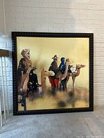 Full front view showing entire square oil painting and frame against white brick background.