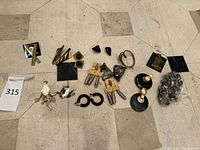 Overhead shot of all jewelry pieces laid out on floor