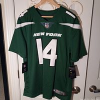 Front view of the green New York Jets NFL jersey with 'NEW YORK' and number 14.