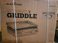 Front view of boxed Blackstone 22" tabletop griddle