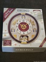 Front of boxed Seiko Melody clock showing branding and packaging