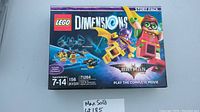 Front view of LEGO Dimensions Story Pack 71264 Batman box, showing key artwork and product details including piece count and age range.