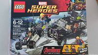 Front of box showing LEGO Marvel Super Heroes Avengers Hydra Showdown set 76030 with vehicle and minifigures on display