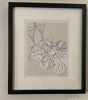 Framed monochrome line art depicting two cava glasses and eight oyster shells in a round plate, with artist's signature visible.