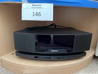 Front view of Bose Wave SoundTouch Series IV audio system on power pad