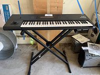 Full front view of Korg M1 on X-style keyboard stand