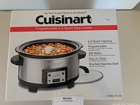 Front view of boxed Cuisinart Programmable 6.5 Quart Slow Cooker showing product image and main features.