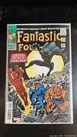 Full front cover of the comic Fantastic Four #52 with Black Panther