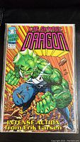 Front cover of The Savage Dragon comic book showing the green dragon character, title, and pricing details.