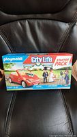 Photo of the sealed Playmobil City Life Wedding starter pack box showing front labeling and artwork depicting the wedding set contents.