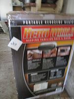 Photo of sealed heater box with branding and safety information.