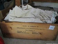 Wooden box with stenciled text showing manufactured by Canadian Industries Ltd.