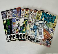 Overview of 10 Marvel Alpha Flight comics spanning issues #28-38 with #31 missing, showing front covers and all comics fanned out