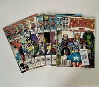 Photo of 10 Marvel The Avengers comic books, issues #270 to #279, fanned out showing cover art and condition.