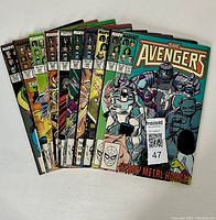 Lot of 10 Marvel The Avengers comics arranged fanned out showing covers with various action-themed covers including issue #280 showing Heavy Metal Horde.