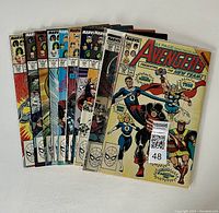 A fan display image showcasing 10 Marvel Avengers comic books from issues 290 to 300 in protective sleeves, fanned out to show the front cover designs.