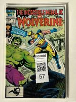 Front cover of 'The Incredible Hulk and Wolverine' comic showing title, price, and characters in action.