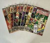 Ten Marvel The Micronauts comic book issues arranged side by side showing front covers.