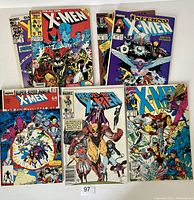 Six Marvel X-Men comic books arranged on a flat surface showing front covers. Includes classic 1990s Marvel art and characters.