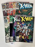 Front covers of 8 Uncanny X-Men comics from issues #228 to #235, showing colorful character artwork and clear condition.