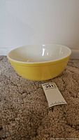 Yellow Pyrex mixing bowl showing exterior and color