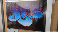 Front view of the Yes band logo poster by Roger Dean, showing vibrant colors and poster condition.
