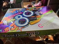 Game box with colorful 1980s design and logo