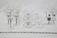 Full set of vintage Belfor crystal stemware and salt/pepper shakers with measuring tape for scale
