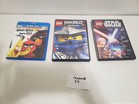 Three kids movies including Angry Birds (Blu-ray), LEGO Ninjago DVD, LEGO Star Wars DVD