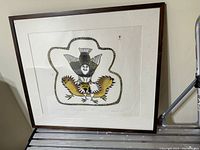 Entire framed stonecut and stencil print matted and in brown wood frame