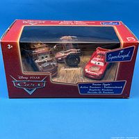 Front view of the unopened Disney Pixar Cars Tractor Tippin 3 Pack in original packaging showing all three tractors inside.