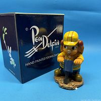 Front view of Pendelfin MAC figurine with box showing branding and hand painted stonecraft note.