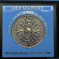 Front of the coin showing the embossed design and inscriptions