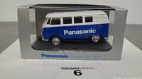 Front view of die-cast VW Minibus branded Panasonic inside original box