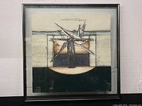 Framed abstract monotype print by Enrico Embroli showing full artwork and frame.