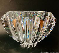 Front view of clear crystal bowl showing cut facets and Orrefors Sweden triangular sticker