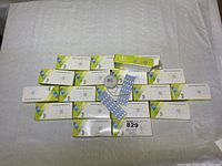 19 new LED ceiling light source panels arranged alongside round LED drivers and original boxes bearing label 'LED Ceiling light source'.