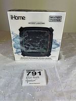Front view of the iHome BT371 speaker box showing the speaker image, brand, model, and product features including the Weather Tough label.