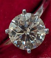 Close-up of round brilliant diamond and prong setting