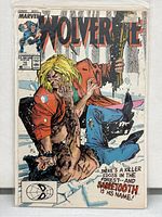 Front cover of Wolverine comic book issue #10 featuring artwork of Wolverine and Sabretooth fight scene, showing detailed illustration and title.