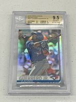 Front view of the 2019 Topps Chrome Refractors Vladimir Guerrero Jr baseball card encased in Beckett slab showing grading details.