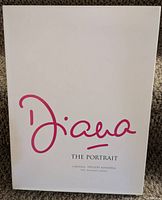 Front cover of the hardcover book 'Diana The Portrait' featuring the title in pink script on a white background.