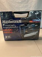 Front view of the sealed Mastercraft air-powered stapler box with product branding and features visible.
