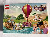 Front of the new sealed Lego Disney Princess set box featuring hot air balloon, horse carriage, and princess mini-figures.