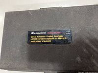 Black labeled carrying case for Equus Pro Dual-Beam Metal Advance Timing Analyzer