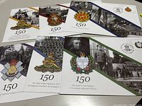 Six commemorative Canadian Army regiment envelopes with stamps celebrating 150 years, featuring different regiment crests and historical images.