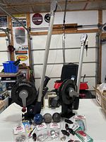 Two Invader Commander 4000 downriggers front view with accessories on table