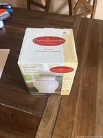 Box packaging of Candle Warmers Glimmer Fragrance Warmer Casablanca with branding and product image.