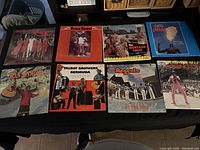 Full lot of 8 visible vinyl LP album covers showing various Caribbean music artists.