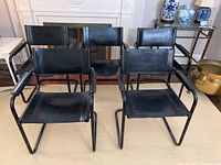 Front view of all five chairs arranged in two rows